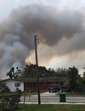Smoke over home in Belle Glade, FL