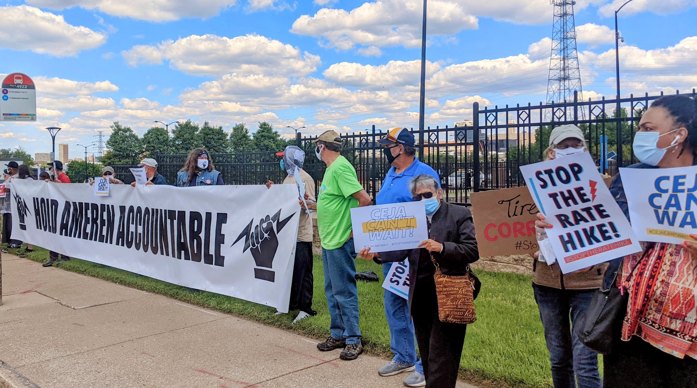 Activists hold a sign that reads, "Hold Ameren Accountable."
