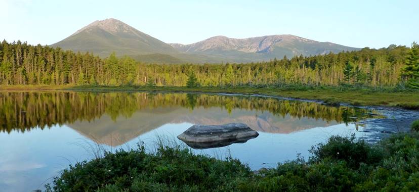 Katahdin, 6 mi to the SW, seen from Martin Ponds, Baxter State Park. The Knife Edge is the jagged section just left of Baxter Peak, the highest point on the left. Hamlin Peak is the center lump. The Appalachian Trail approaches Baxter Peak from the SW (behind and left). The pond shoreline abounds with pitcher plants and blueberry. Martin Ponds are just west of the new Katahdin Woods and Waters National Monument. Taken the day after the one on The Knife Edge.
