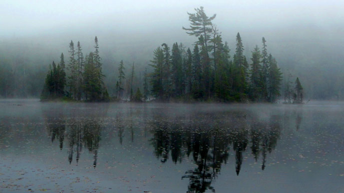 glacial lake on a foggy afternoon