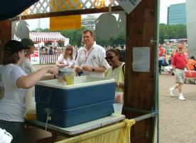 Our friendly volunteers helping some folks beat the heat at our north leg booth.