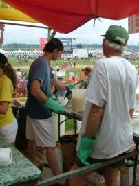 Enjoying the music, the crowd, and the comraderie at our main entrance booth.