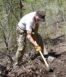 Volunteer working on trail