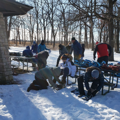 Trying out snowshoes at Winter Fun day