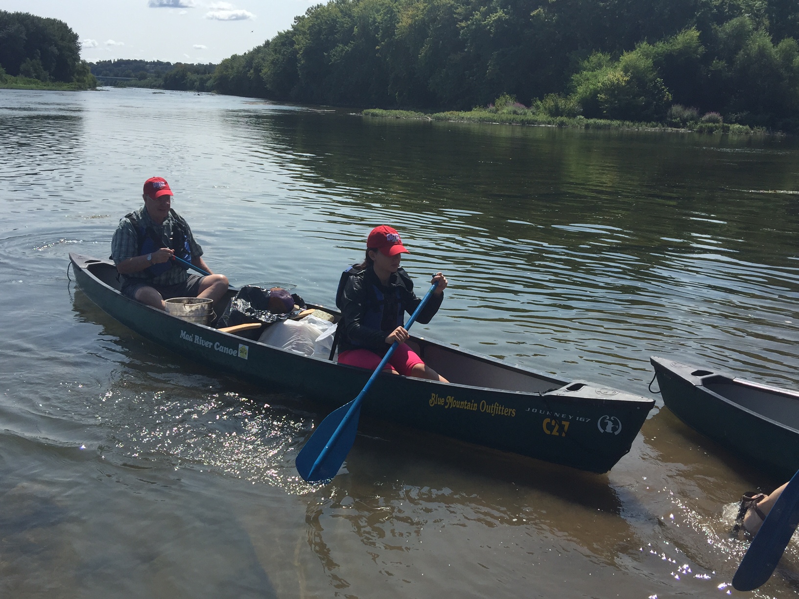 Two kayakers enjoying the GVP River Cleanup Day!