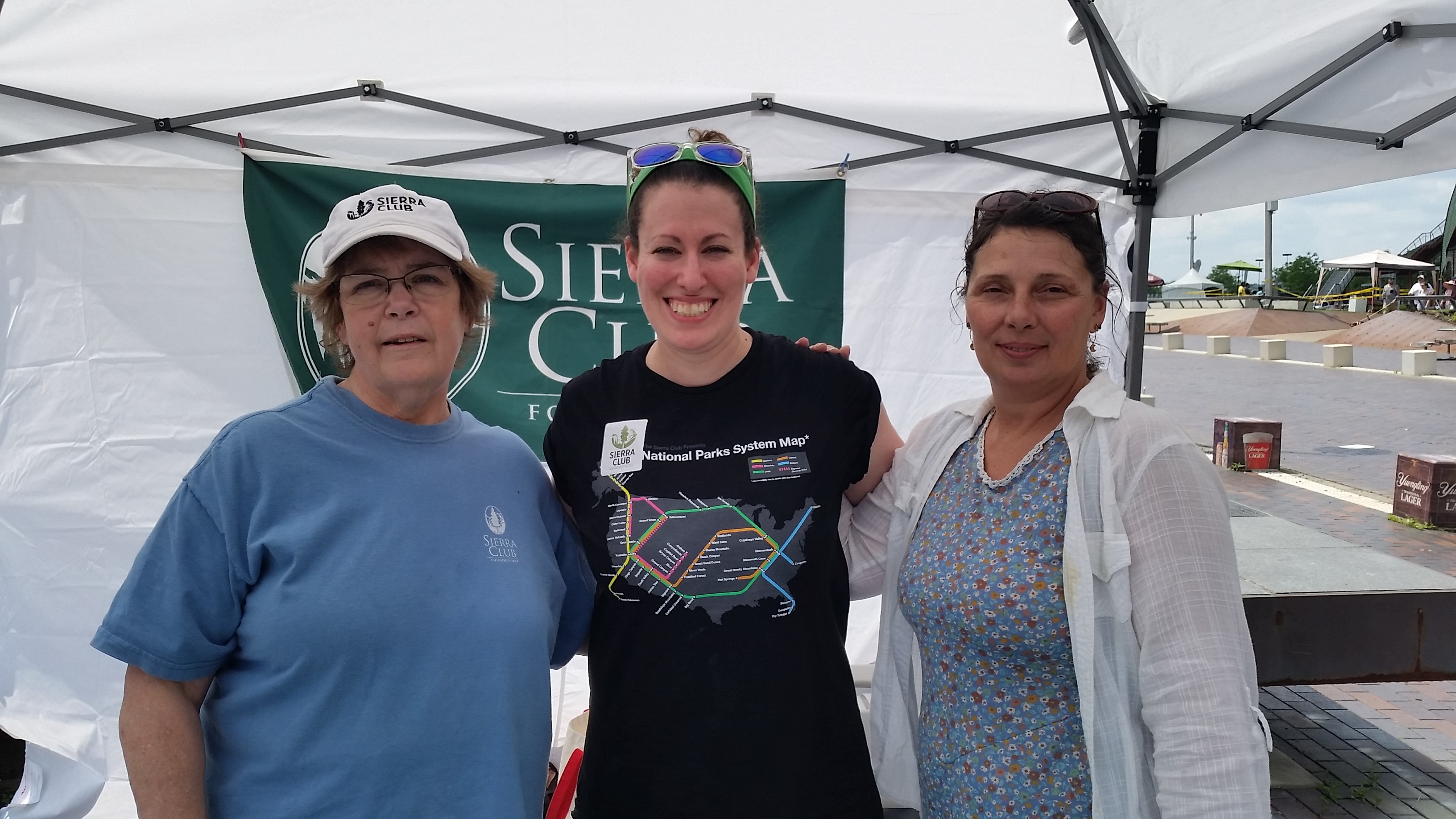 Three Sierra Club volunteers at a tabling event