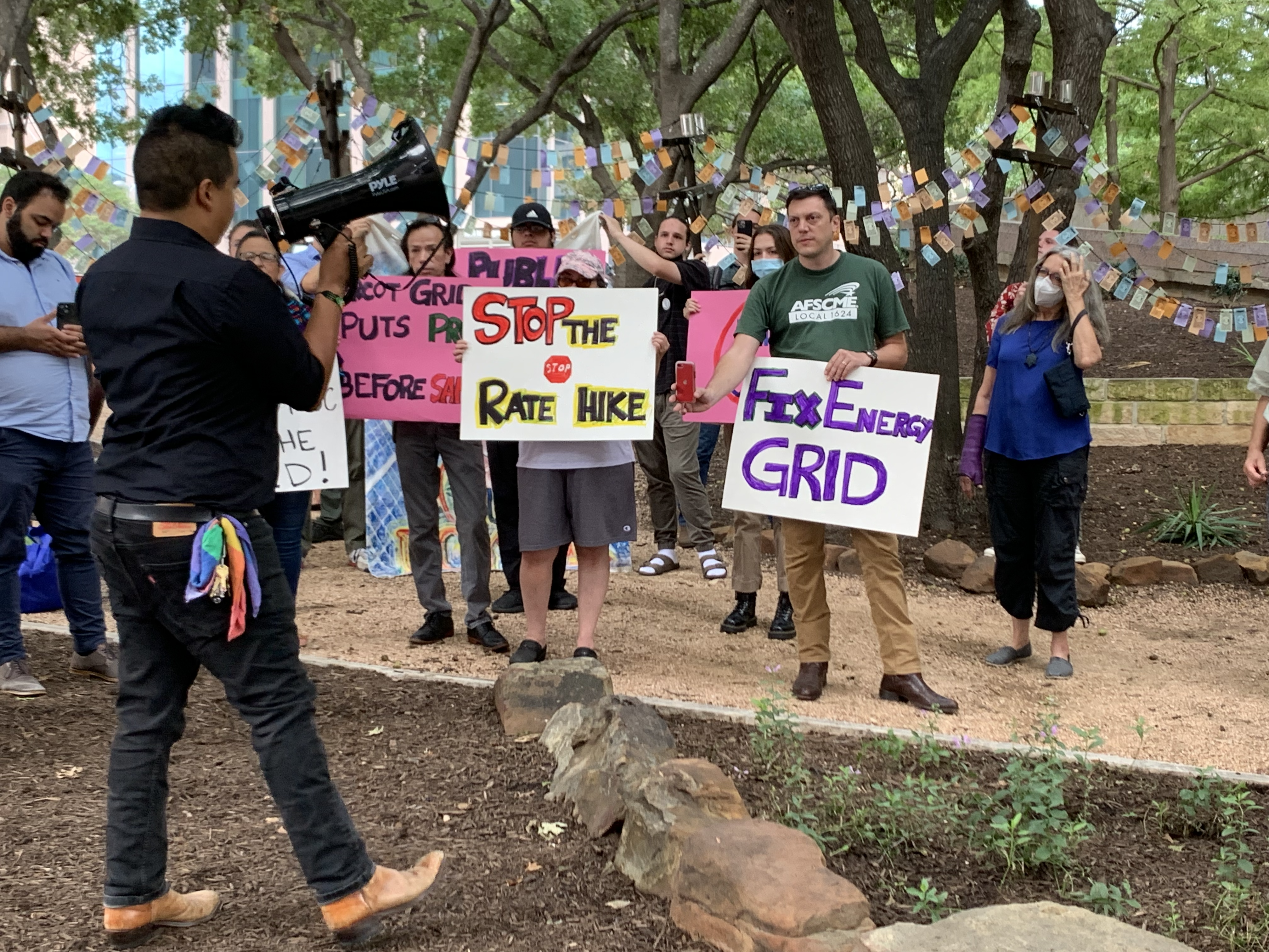 Public rallies outside the offices of the Public Utility Commission of Texas