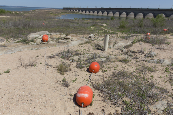 Overlooking water, dried up aquifer, with bridge running through