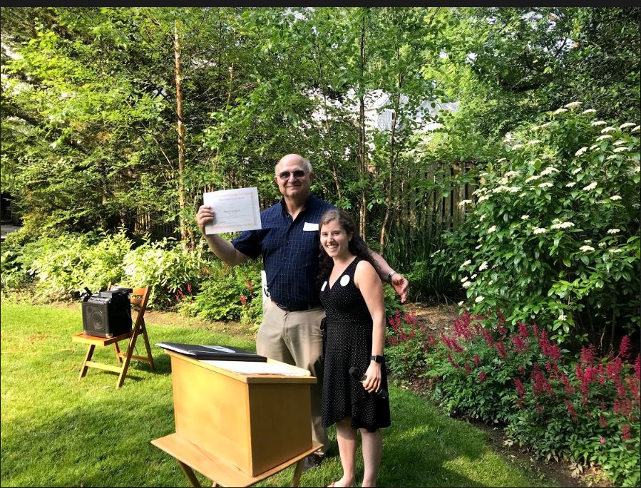 Handing award to Brad German