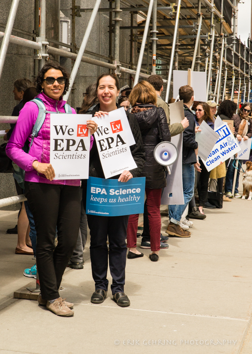 Two women holding we Lv (element Livermorium) EPA Scientists