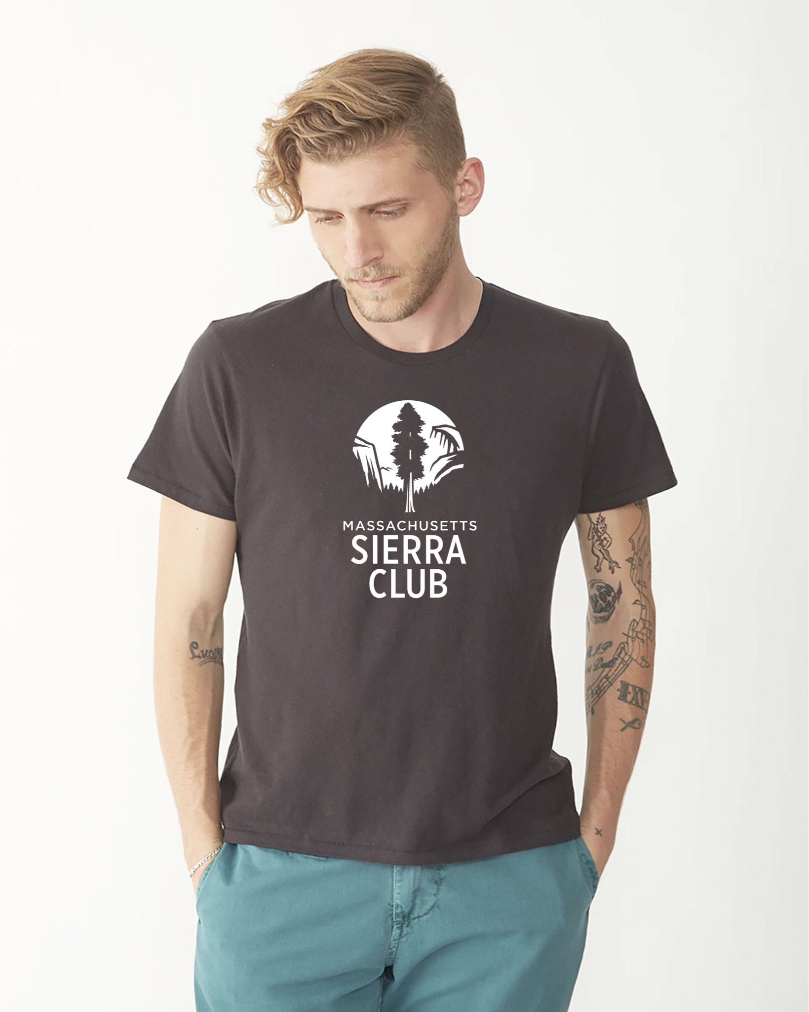 Male model wearing chocolate brown shortsleeved Massachusetts Sierra Club tshirt 