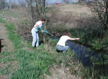 Two volunteers test water downstream from a Lenawee County CAFO. Two volunteers test water downstream from a Lenawee County CAFO.