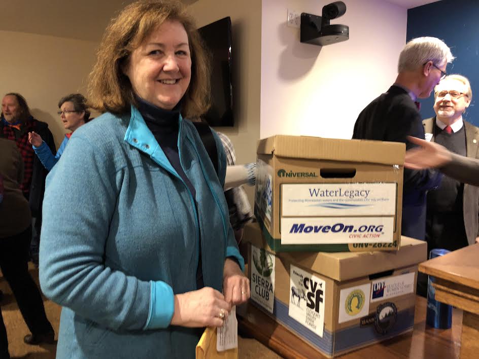 Susan Flygare delivers Polymet petitions