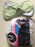 photo of plastic next to washable, reusable menstrual pads