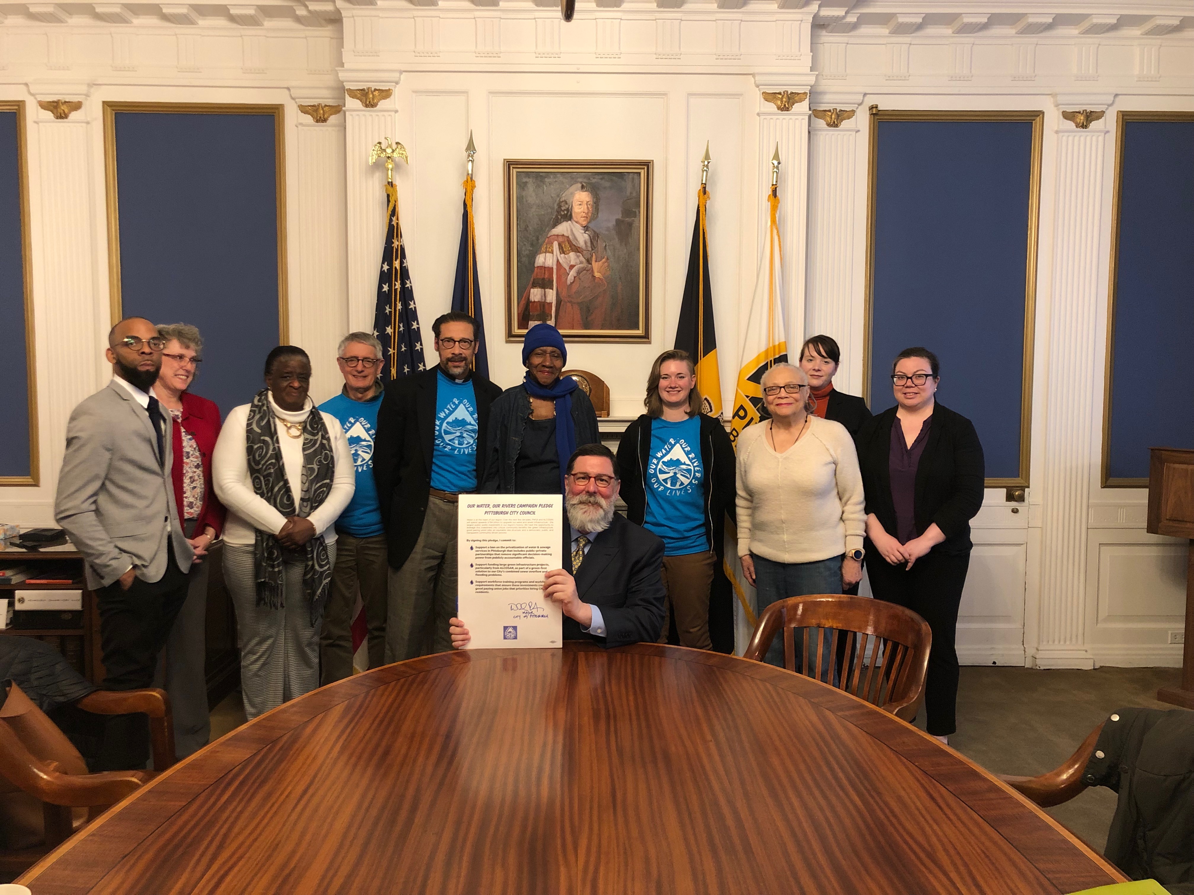 Mayor Peduto holding signed pledge Mayor Peduto holding signed pledge