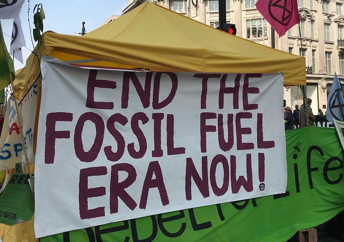End the Fossil Fuel Era Now sign