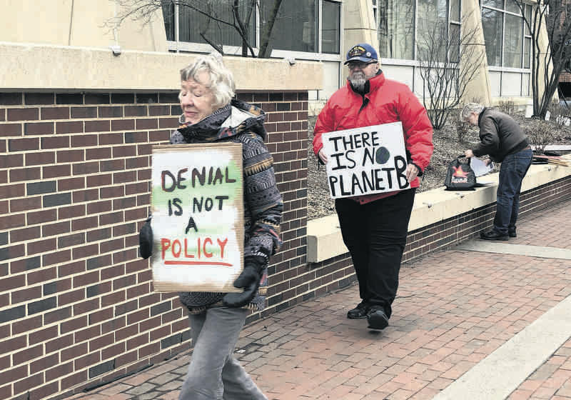 Chair Doug Mason protesting