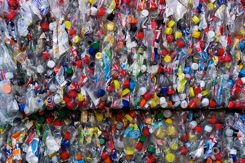crushed plastic bottles getting ready for recycling