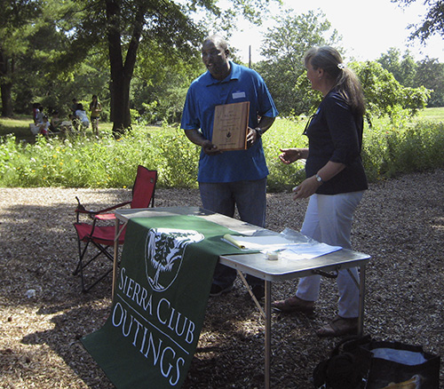 Vernon Wade receiving award