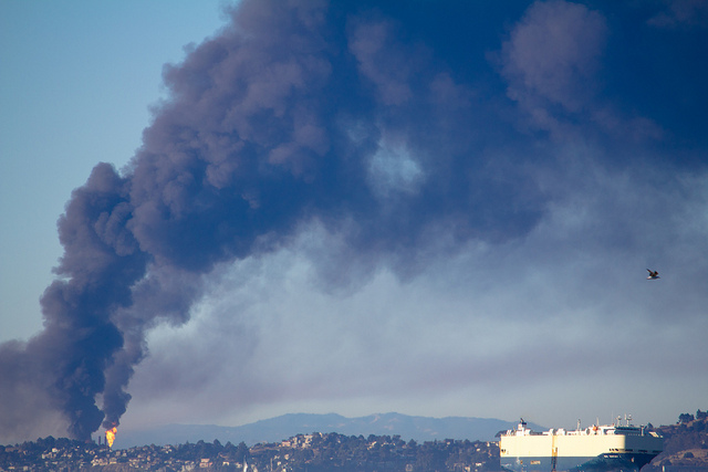 Richmond hills with plume of fire and huge dark cloud