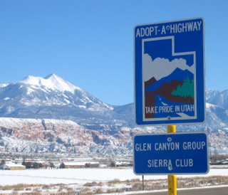 Road sign showing that a particular section of highway has been adopted by Glen Canyon Group of the Sierra Club.