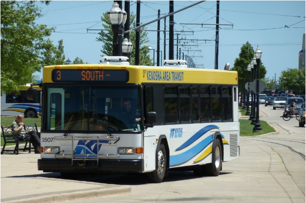 A Kenosha Area Transit bus on a sunny day