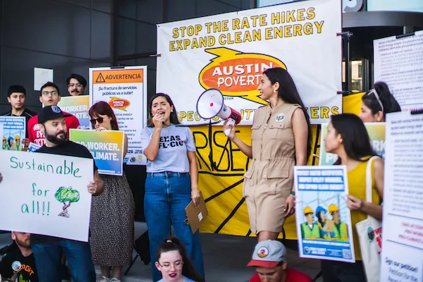 Protestors argue for fairer Austin Energy rates.