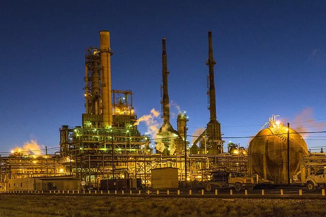 oil refinery at night