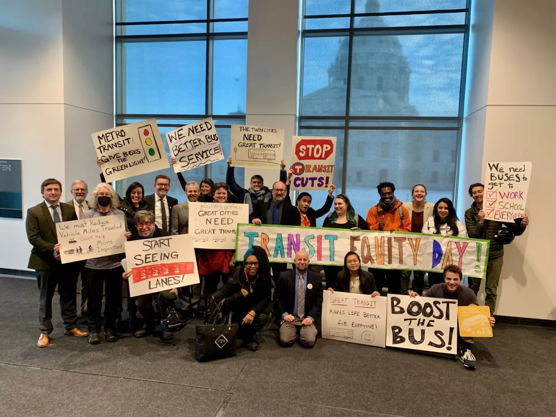 Testifiers, transit and climate experts, Transportation Forward coalition partners, and Minnesota Senate Transportation Chair Scott Dibble gather outside a Senate hearing room for Transit Equity Day. Photo: Move Minnesota