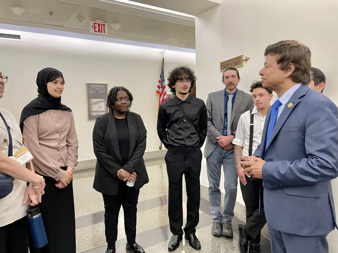 Rep. Shri Thanedar talks to Hamtramck High School students and other OAK Week 2023 attendees.