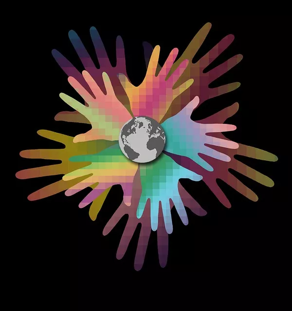 multicolor hands around a globe