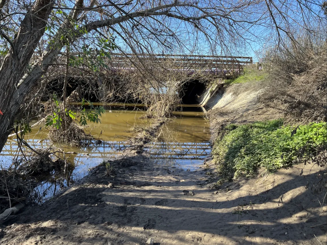 Palo Alto Baylands underpass flooded with water over a walking path during the King Tide.