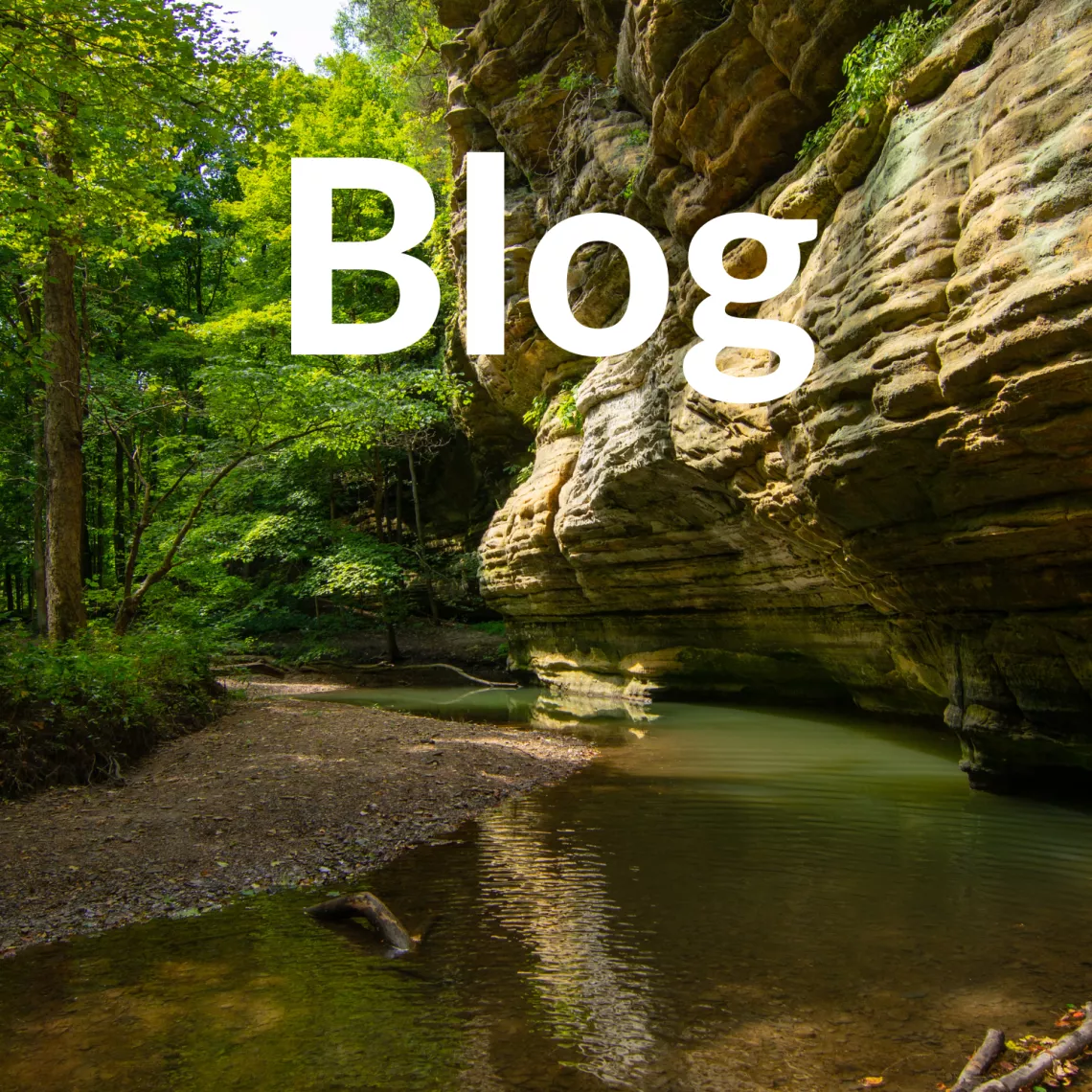 A photo of Starved Rock State Park in Illinois appears behind white text that reads, "Blog."