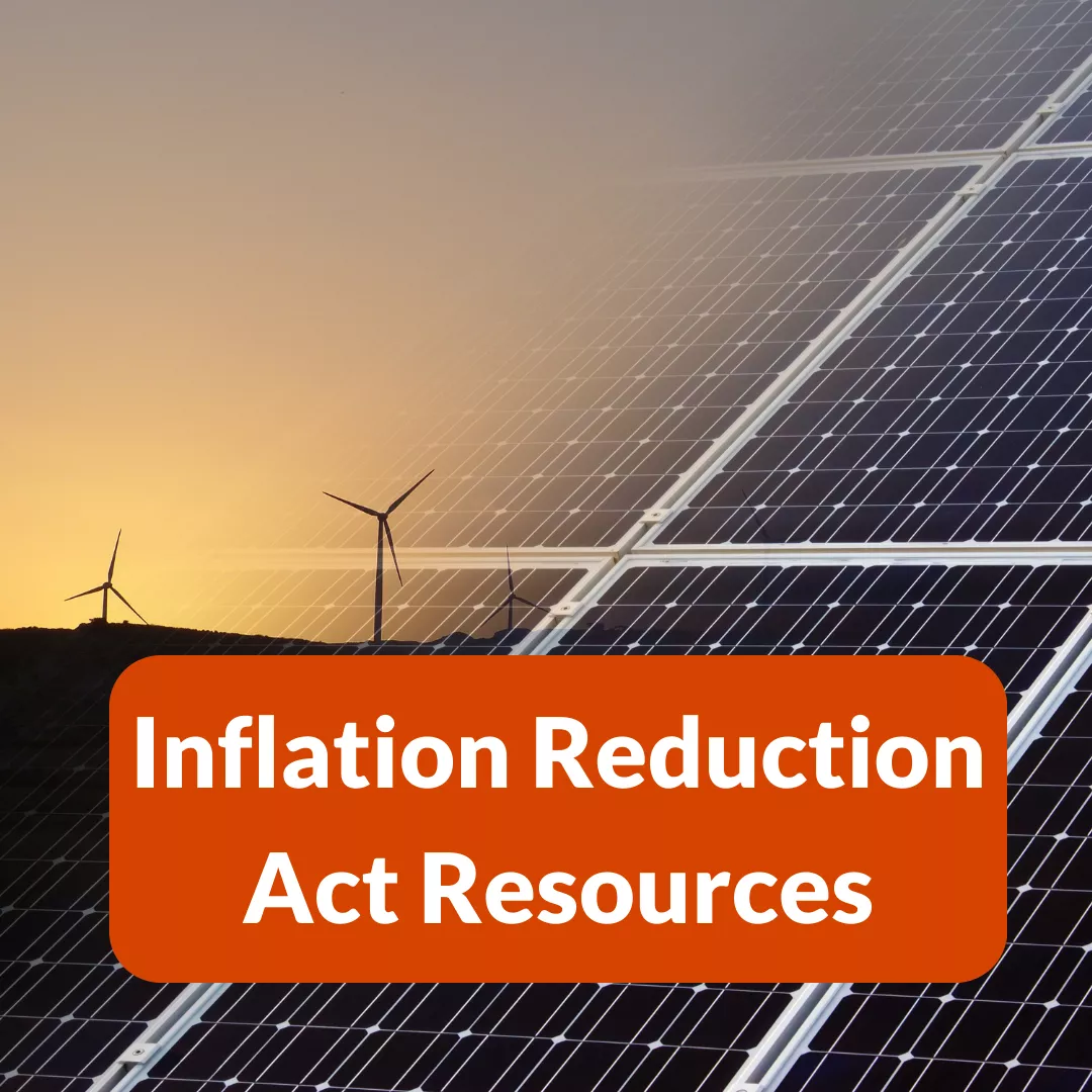 Inflation Reduction Act Resources text over solar panels and wind turbines