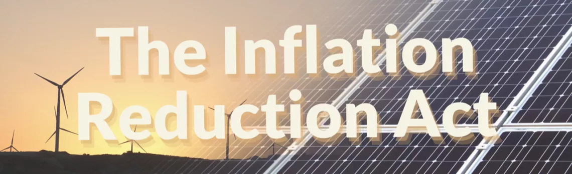Inflation Reduction Act in text over solar panels