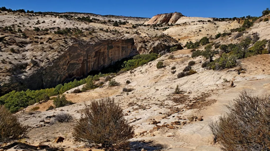 Upper Calf Creek Falls is at the right end of the canyon