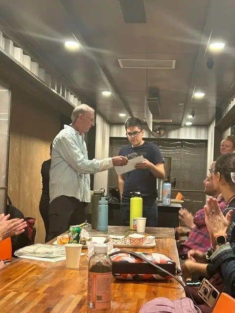 Alfredo accepting a certificate from ICO Chair Al Bellavia