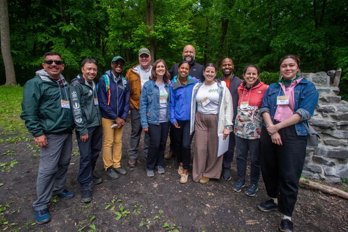 The Outdoors for All team poses with Sierra Club Executive Director Ben Jealous at the 2023 Outdoors Alliance for Kids Week in Rock Creek Park.