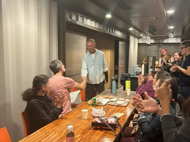 ICO Chair shaking hands with Leader Steve Pothier
