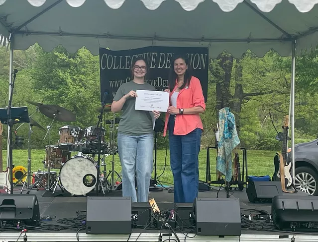 Nat presenting the Living Green award to friends of the rappahannock