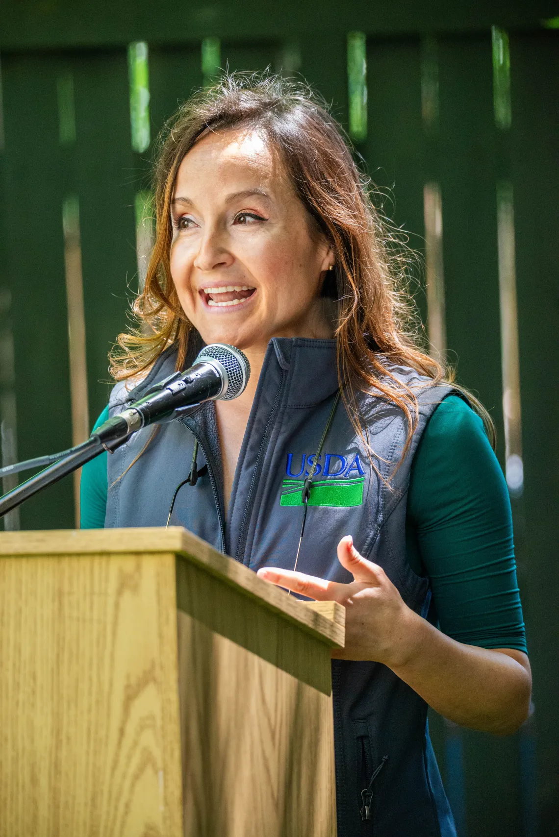 USDA NRE Chief of Staff Andrea Delgado speaks at a podium