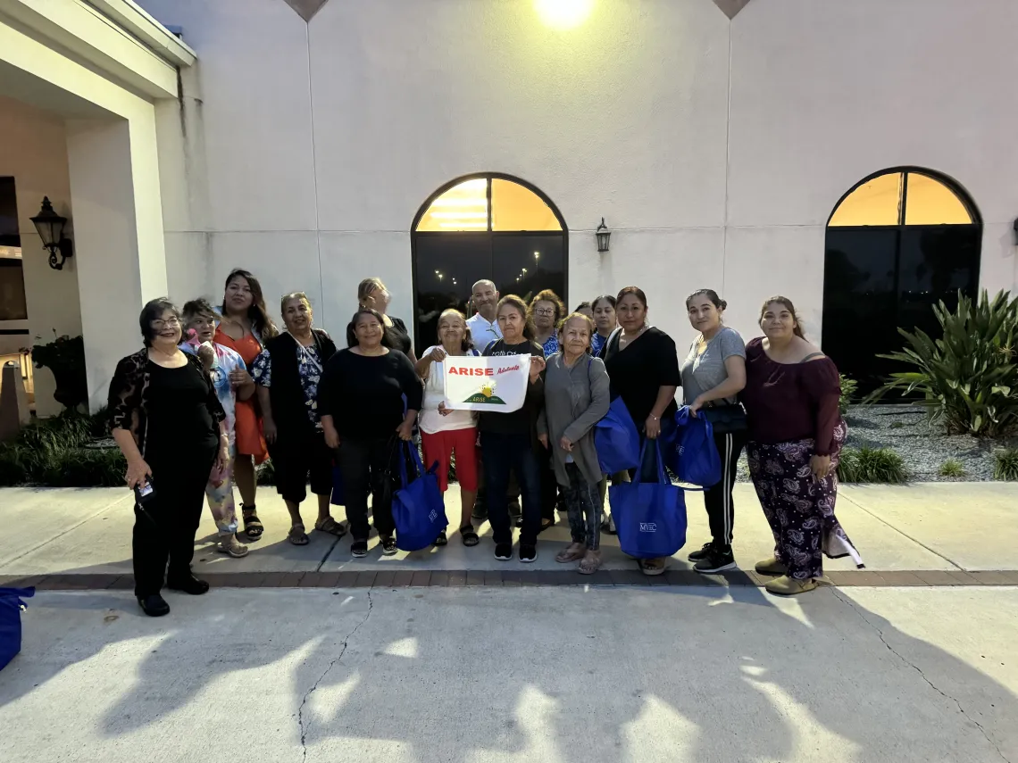 Magic Valley Electric Cooperative members gather outside the co-op's annual meeting.