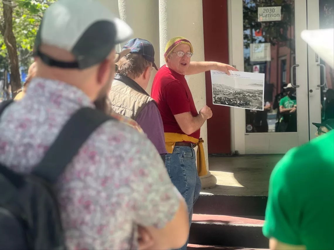 Man giving presentation during community outreach
