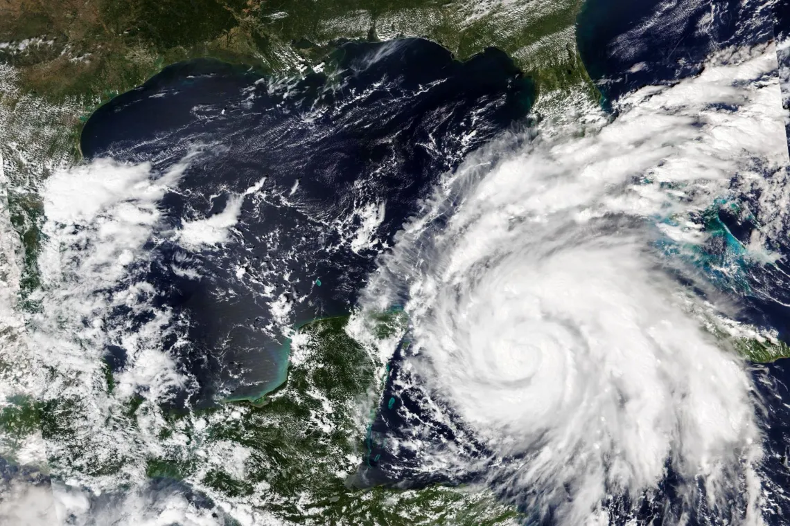 satellite image of the gulf of Mexico with a hurricane positioned over the southwest portion of Florida
