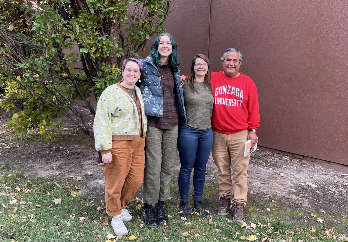 Picture of Idaho Chapter staff Vienne, Amanda, Lisa, and Julian standing next to each other outside