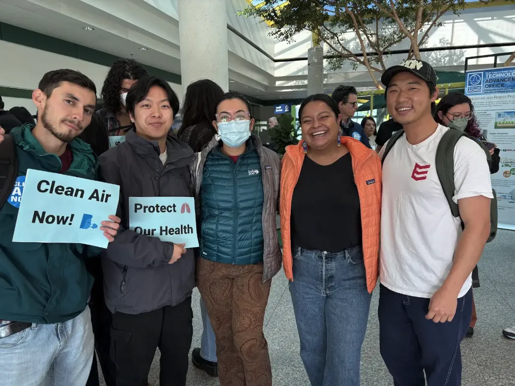 Activist Academy Graduates Julio, Jason, Janelle, Chapter Conservation Program Manager Kim, and Community Partner Francis- Clean Air Advocates at the December AQMD Governing Board Meeting. 