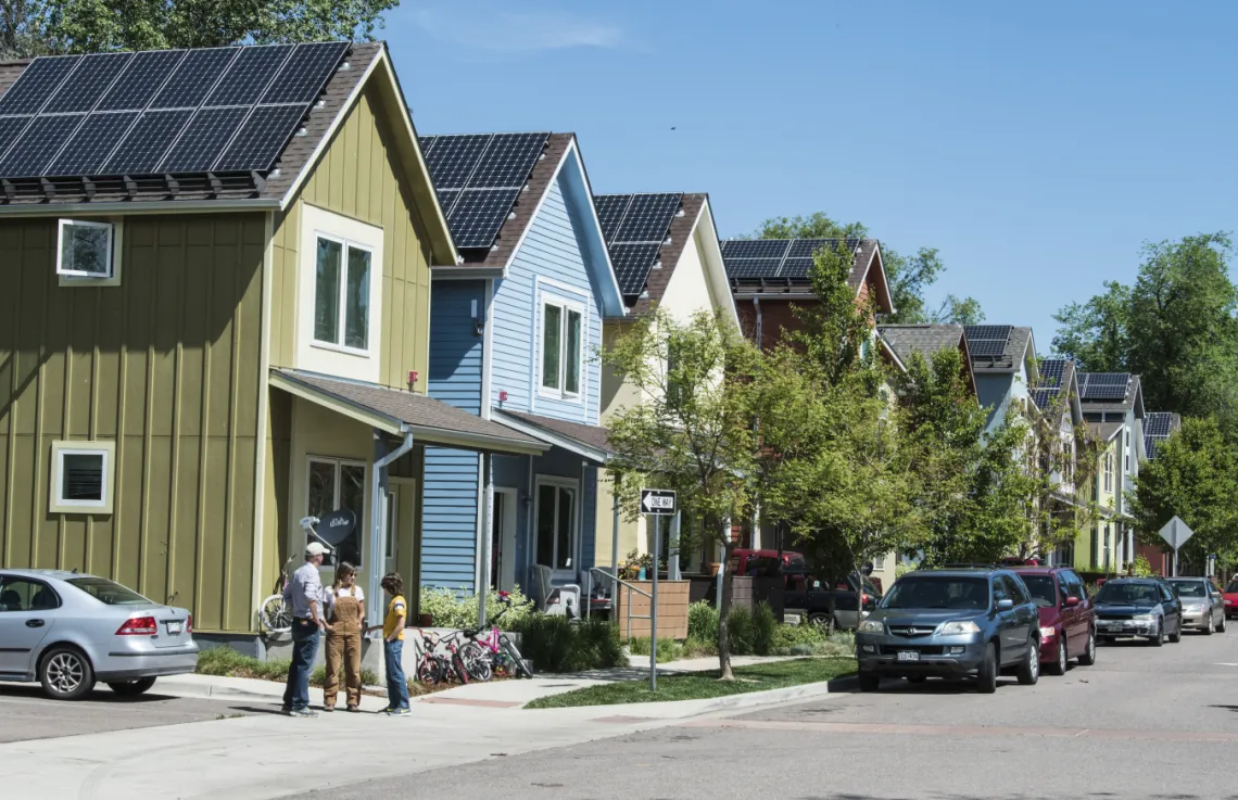 row of houses with solar panels