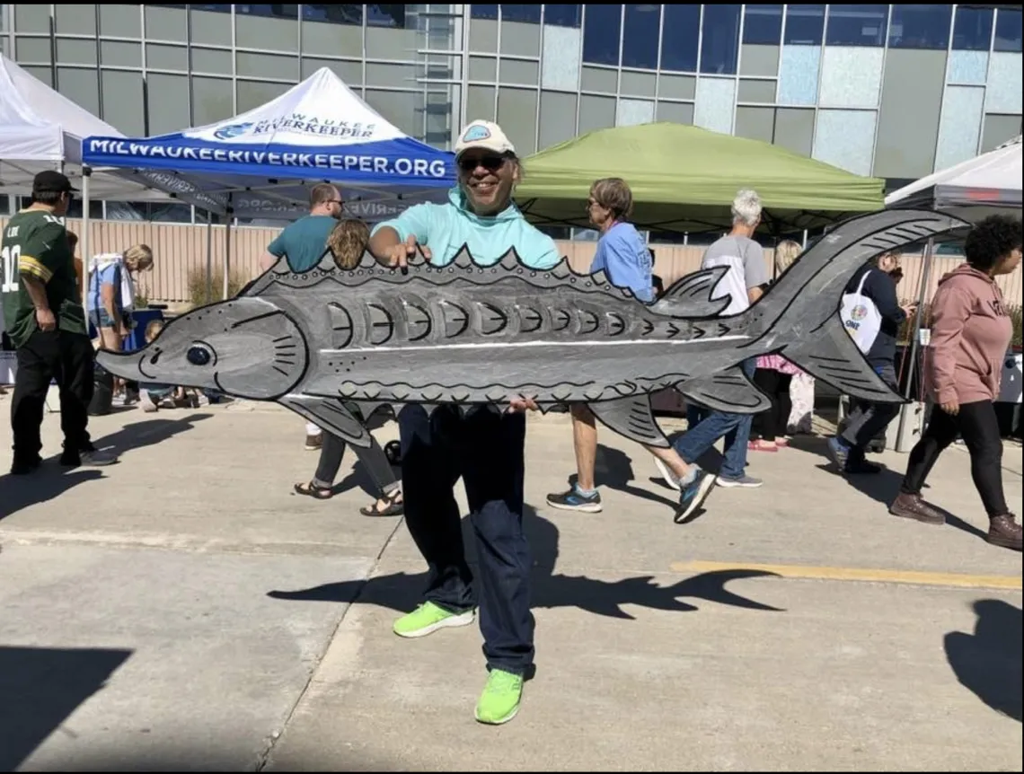 Mark Denning advocates for the Sturgeon Protectors at a Milwaukee event. 