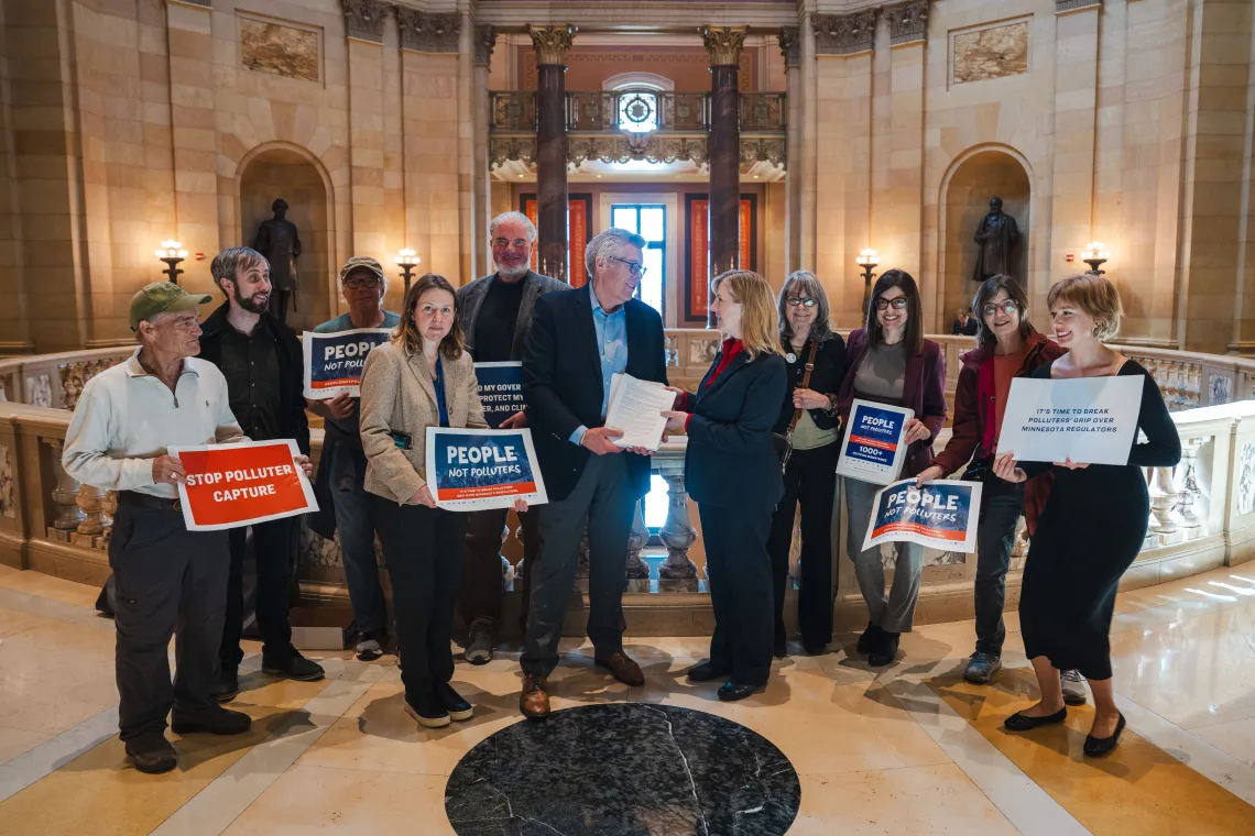 Sierra Club in the Minnesota State Capitol advocating for People not Polluters. Photo credit: Devon Young Cupery