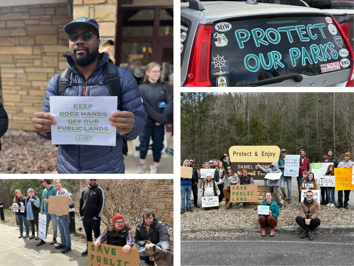 People stand next to the Red River Gorge sign holding protest signs to protect public lands.